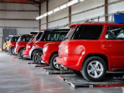 Professional surface preparation and priming in auto paint shop